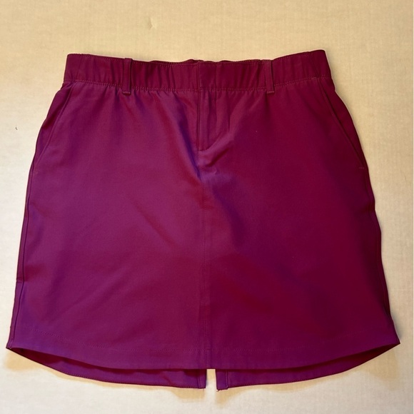Under Arnour women’s Links woven golf performance skort in purple Sz-8. L19 - Picture 3 of 9